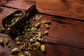 Fresh green hops on wooden table Royalty Free Stock Photo