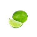 Fresh green juicy limes and lime slices isolated on white background. Royalty Free Stock Photo