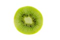 Fresh green kiwi fruit slice close up partially isolated on white background with selective focus, view from above Royalty Free Stock Photo