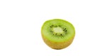 Fresh green kiwi fruit slice close up partially isolated on white background with selective focus, view from above Royalty Free Stock Photo