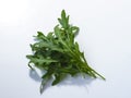 fresh green leaves arugula rocket salad in blue container Royalty Free Stock Photo