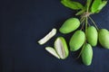 Fresh green mango fruit on a wooden table. Royalty Free Stock Photo