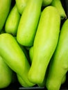 Fresh green marrow gourd in supermarket