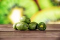 Fresh green mini baby kiwi fruit with sliced kiwi Royalty Free Stock Photo