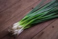 Fresh green onion on wooden table Royalty Free Stock Photo