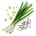 Fresh green onions and black peppercorns on white background Royalty Free Stock Photo