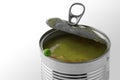 Fresh green pea on the edge of a tin can with vegetable soup, ba Royalty Free Stock Photo