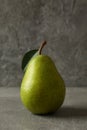 Fresh green pear on gray background, close up Royalty Free Stock Photo