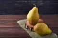 Fresh green pears on a rustic background