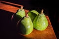 Fresh Green Pears on Wooden Table in Fuenteheridos