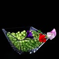 Fresh green peas with buds in a glass vase Royalty Free Stock Photo