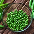 Fresh green peas peeled in a glass bowl Royalty Free Stock Photo