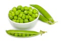 Fresh green peas in a white bowl, fresh pea`s pods, open and closed. Isolated on white background, close-up Royalty Free Stock Photo