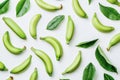 Fresh green plantains and leaves elegantly scattered on a bright Royalty Free Stock Photo
