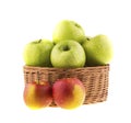 Fresh green and red apples in a wicker baskets Royalty Free Stock Photo