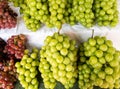 The fresh green and red grapes on the stall Royalty Free Stock Photo