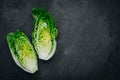 Fresh Green Romaine Lettuce for Caesar Salad on dark stone background Royalty Free Stock Photo