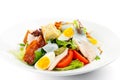 Fresh green salad with chicken, bacon, eggs, tomatoes and croutons Royalty Free Stock Photo