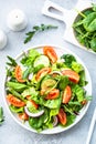 Fresh green salad with leaves and vegetables.