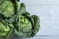 Fresh green savoy cabbages on grey wooden table Royalty Free Stock Photo