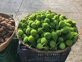 Fresh and green spiny gourd vegetable display in the market