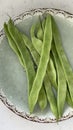 Fresh green string beans in a bowl on a marble table Royalty Free Stock Photo