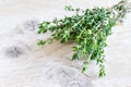 Fresh green thyme herb on old wood background Royalty Free Stock Photo