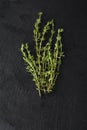 Fresh green thyme, Thymus vulgaris, on dark slate Royalty Free Stock Photo