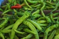 Fresh green whole chili peppers. Pepper for healthy, hot and spicy to help fat burning. An ingredient for cooking spicy dishes