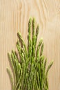 Fresh wild asparagus on wooden table Royalty Free Stock Photo