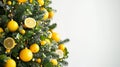 A fresh green and yellow Christmas tree with lemon-themed decorations Royalty Free Stock Photo