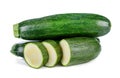 Fresh green zucchini with slice isolated on white Royalty Free Stock Photo