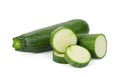 Fresh green zucchini with slices isolated on white Royalty Free Stock Photo