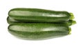 Fresh green zucchini on a white background, vegetables close-up Royalty Free Stock Photo