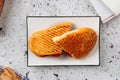 Fresh grilled panini pepperoni on light background