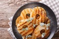 Fresh grilled pineapple rings with mint close up on a plate. horizontal top view Royalty Free Stock Photo