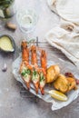 Fresh grilled shrimps served with sauce and crusty bread Royalty Free Stock Photo