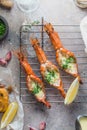 Fresh grilled shrimps served with sauce and crusty bread Royalty Free Stock Photo