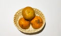 Fresh of group orange fruit in rattan basket 