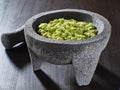 Fresh guacamole in stone molcajete Royalty Free Stock Photo