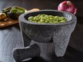 Fresh guacamole in stone molcajete Royalty Free Stock Photo