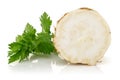 Fresh half celeriac with leaves isolated on white