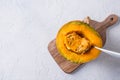 Fresh half pumpkin, cooking. Healthy food. Copy space