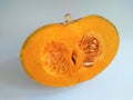 Fresh a half pumpkin (Kobacha squash) on white background