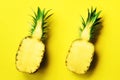 Fresh half sliced pineapple on yellow background. Top View. Copy Space. Bright pineapples pattern for minimal style. Pop Royalty Free Stock Photo