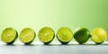 Fresh Halved Lemon Lined Up on Table. Sour Summer Citrus Fruit. Lime Slices on Green Background. Generative AI Royalty Free Stock Photo