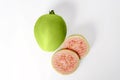 Fresh halves pink guava isolated on white background