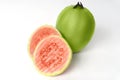 Fresh halves pink guava isolated on white background