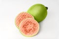 Fresh halves pink guava isolated on white background