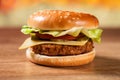 Fresh hamburger on wooden table